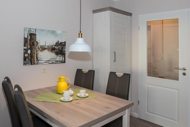 Utesch'S Ferienwohnungen Neuharlingersiel Esterno foto
